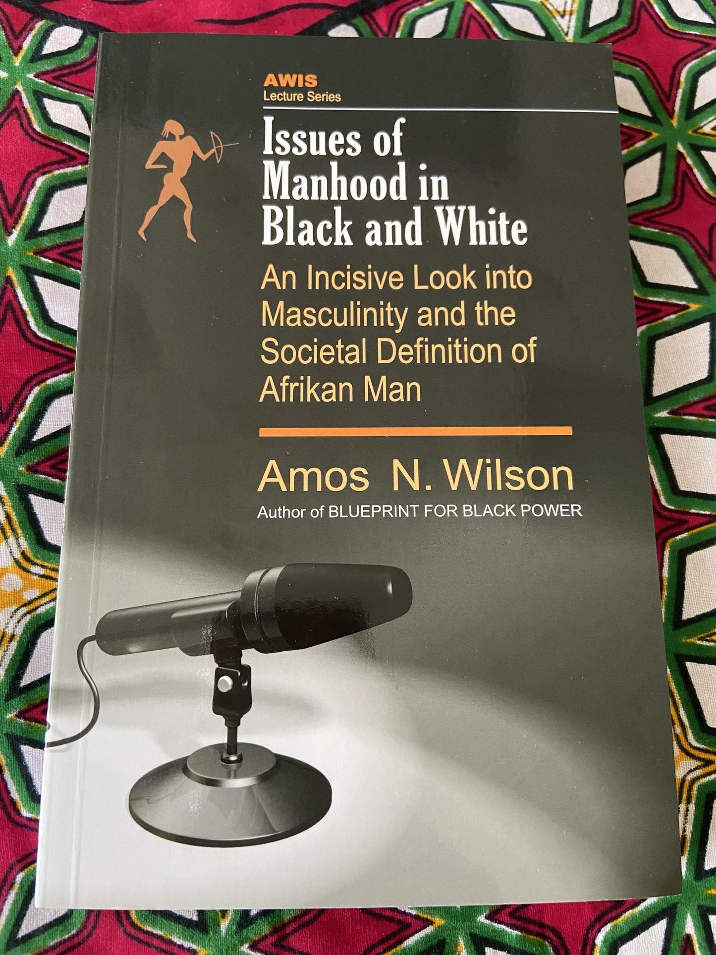 "Issues Of Manhood In Black And White; An Incisive Look Into Masculinity And The Societal Definition Of Afrikan Man" by Amos N. Wilson